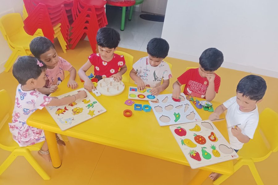 Toddler playing with puzzles and educational toys to build skills