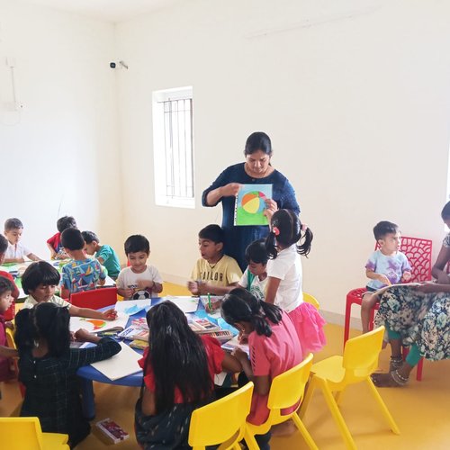 Drawing and art class at Waddle Kids — building fine motor skills and creative expression