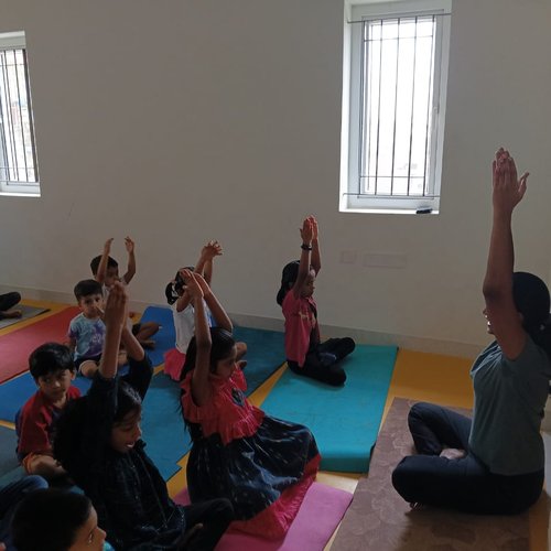 Kids yoga session at Waddle Kids Preschool — mindfulness and physical wellness for children