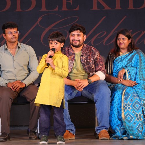 Waddle Kids Annual Day event — proud parents watching children perform