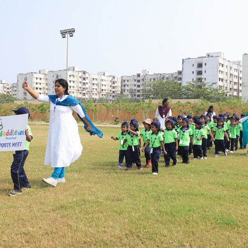 Children enjoying a balance and coordination game during Waddle Kids Sports Day